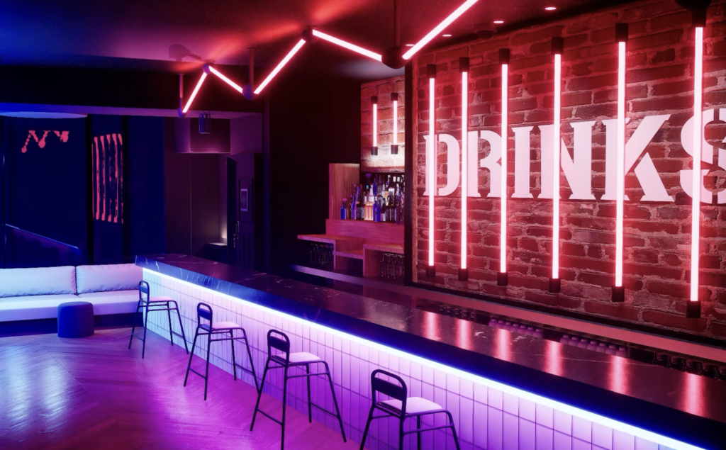 Vibrant Pink Neon Bar with Urban Nightclub Vibes